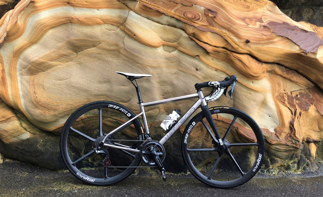 Custom titanium bicycle with bike ahead composites biturbo road wheelset