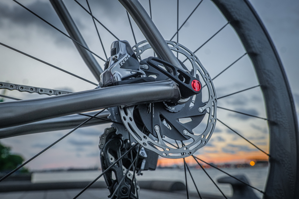 Custom titanium bicycle with flatmount