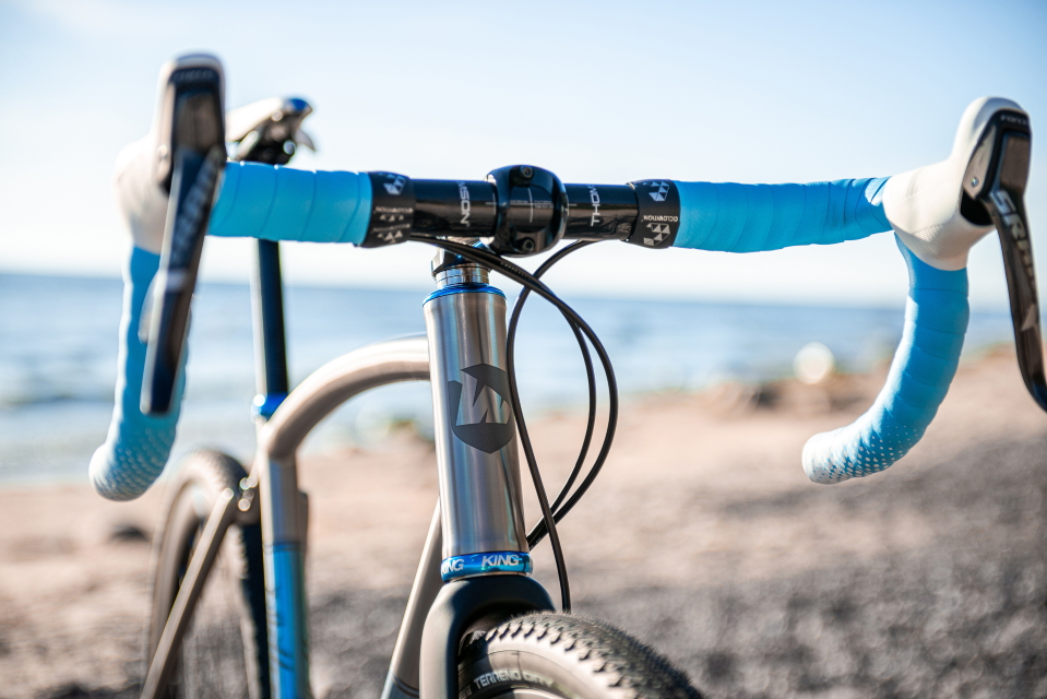 Custom titanium gravel bicycle with Chris King InSet8 turquoise headset