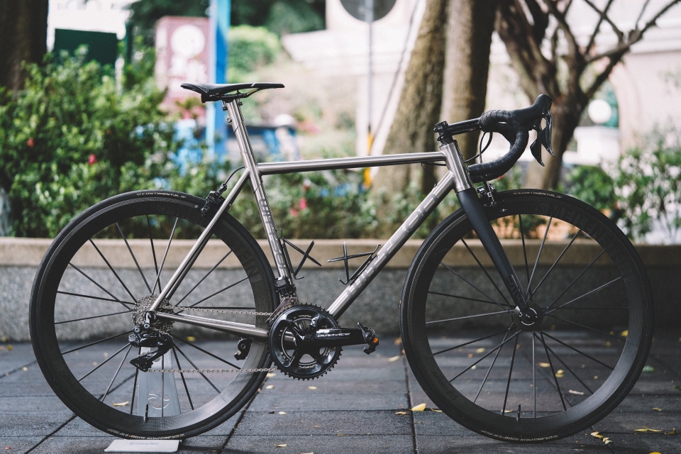 custom titanium road bicycle with dura ace groupset and lightweight meilenstain wheelset